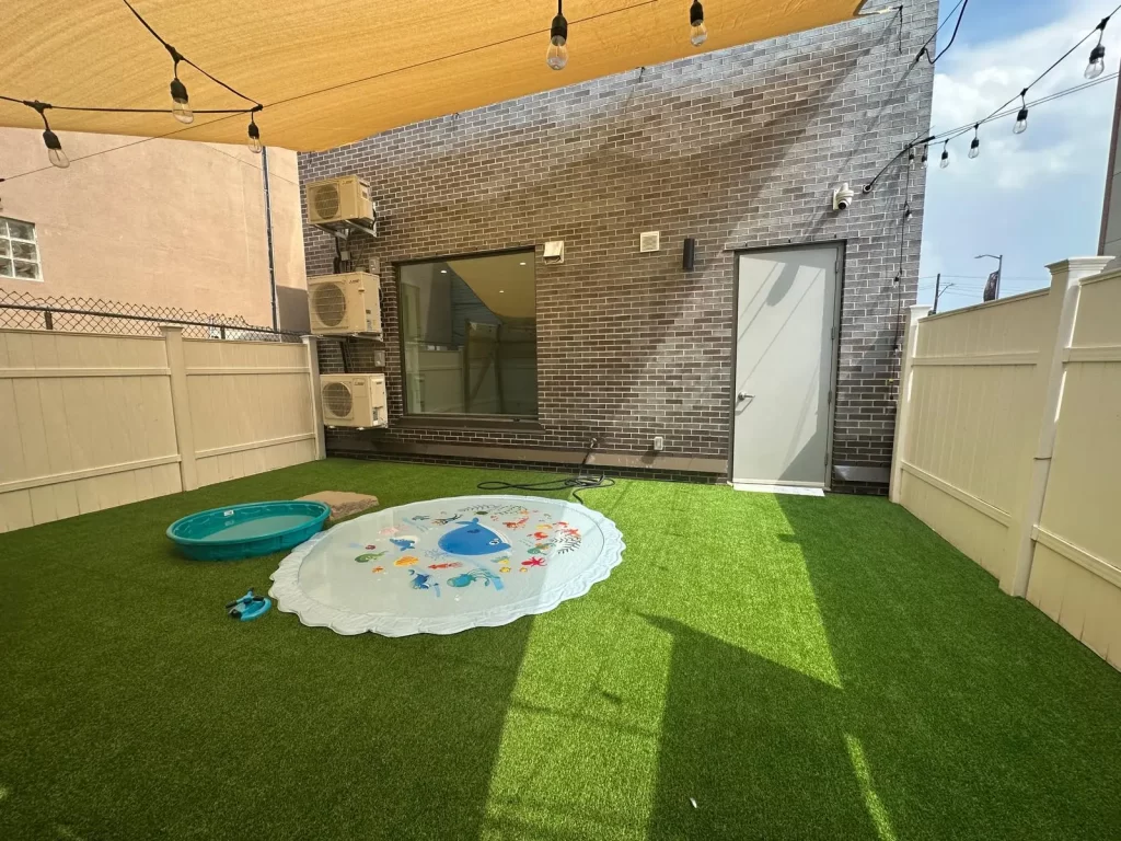 Happy dogs playing and socializing at CANINO dog daycare in Astoria, in a safe and supervised environment.